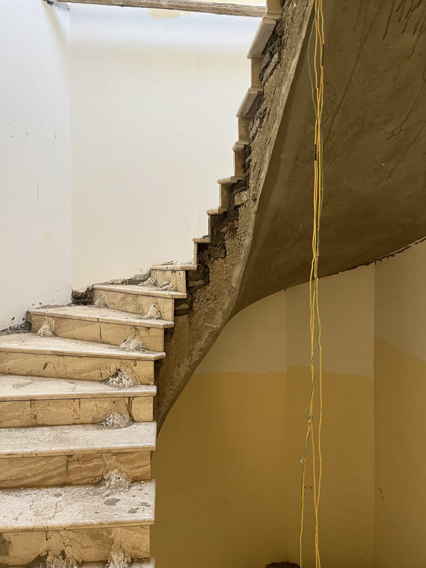 Before: staircase during works