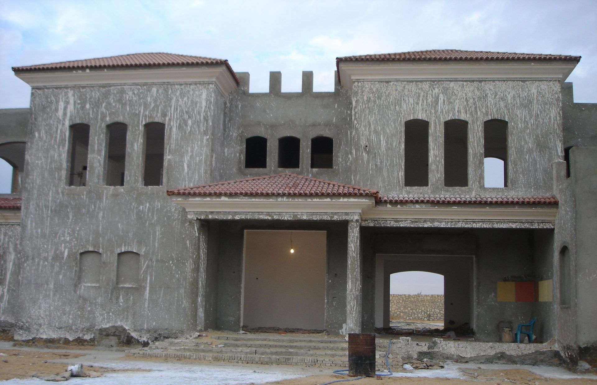 Construction stage: rendered shell before finishing