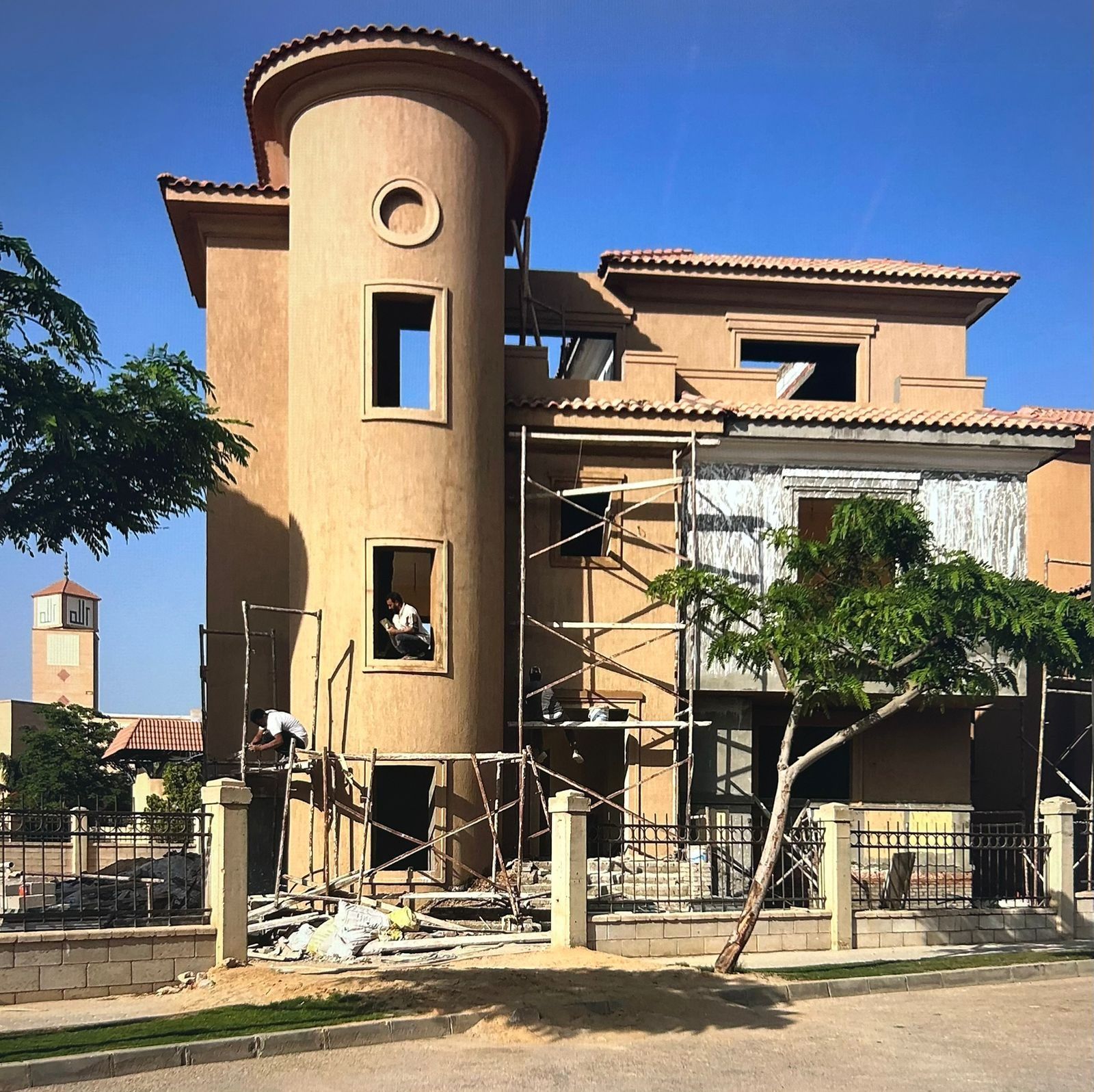 Construction stage: facade finishing with scaffolding