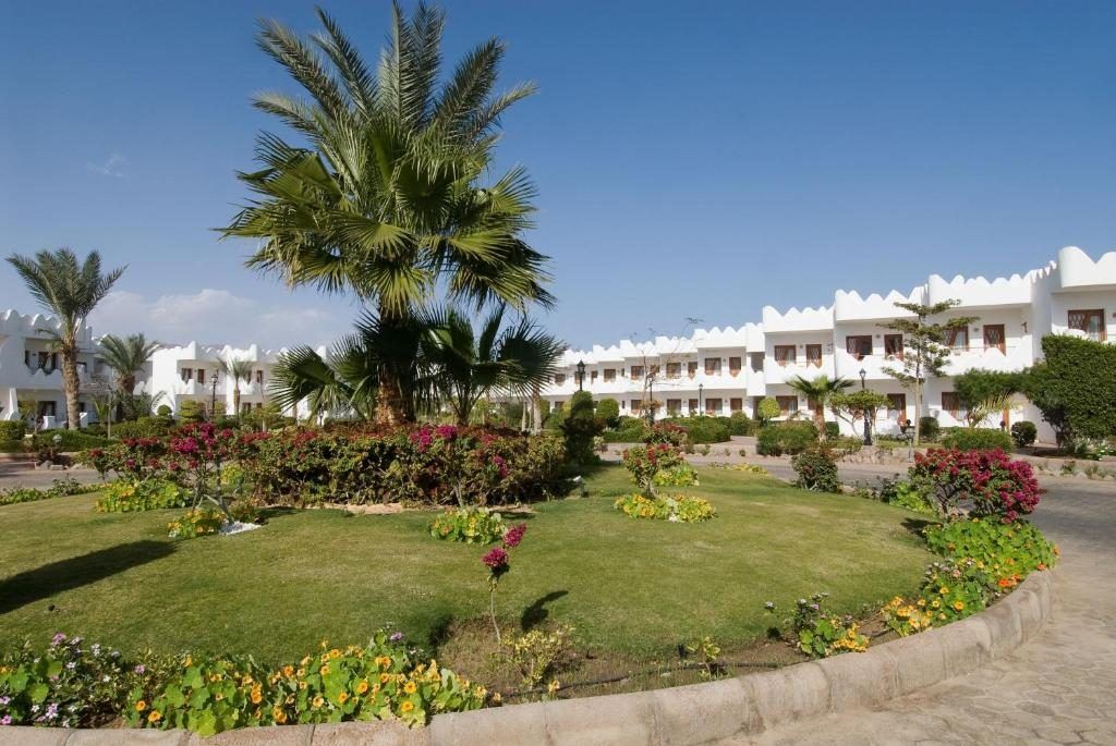 Landscaped gardens in front of the resort buildings
