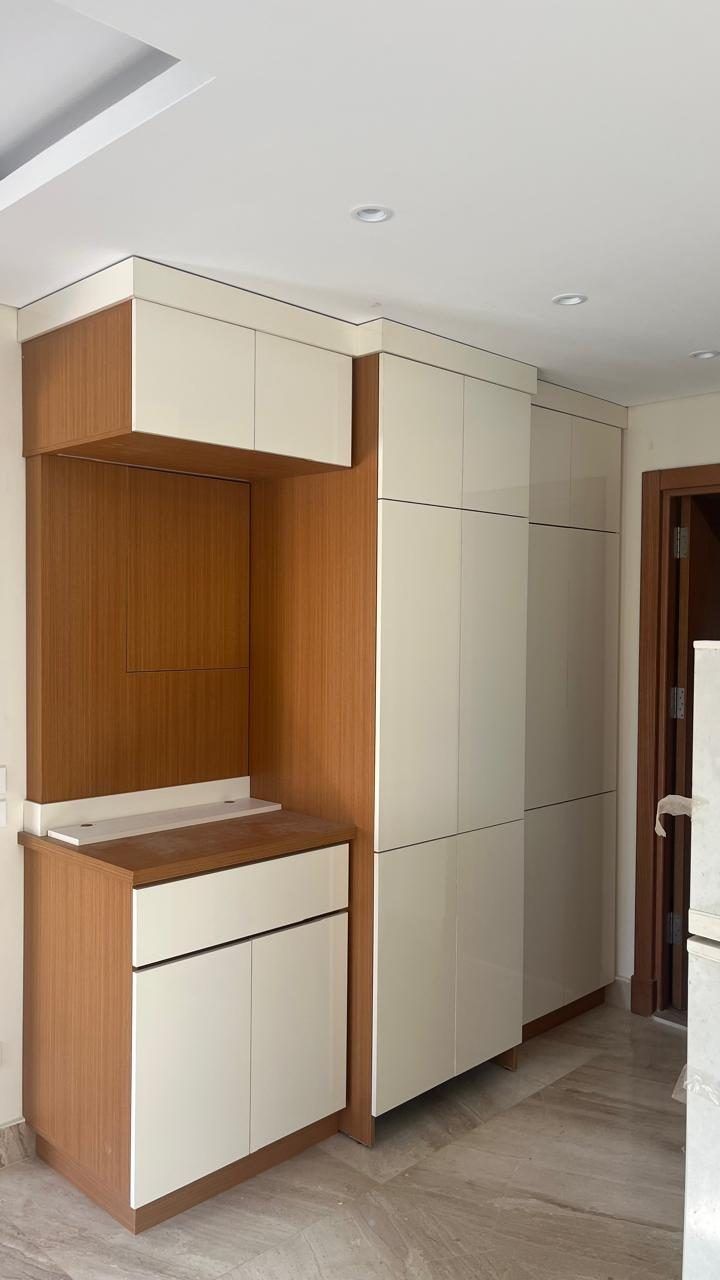 Walnut and white tall-unit joinery